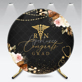Aperturee - Aperturee Black and Gold Congrats Grad RN Round Backdrop with Stethoscope and Elegant Floral Decor for Nurse Graduation Party