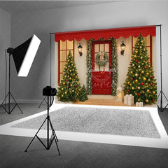 Aperturee - Aperturee Christmas Front Porch Photography Backdrop Red Door with Garland and Trees Welcoming Holiday Photo Background