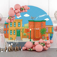 Aperturee - Aperturee Colorful Cartoon City Street Round Backdrop with Sunny Days Sky Neighborhood Buildings and Flying Airplane.