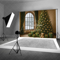 Aperturee - Aperturee Cozy Christmas Room Photography Backdrop Snowy Window with Green and Gold Tree Elegant Holiday Photo Background