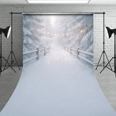Aperturee - Aperturee Dreamy Winter Wonderland Sweep Backdrop with Snow Covered Pine Trees and Festive String Lights