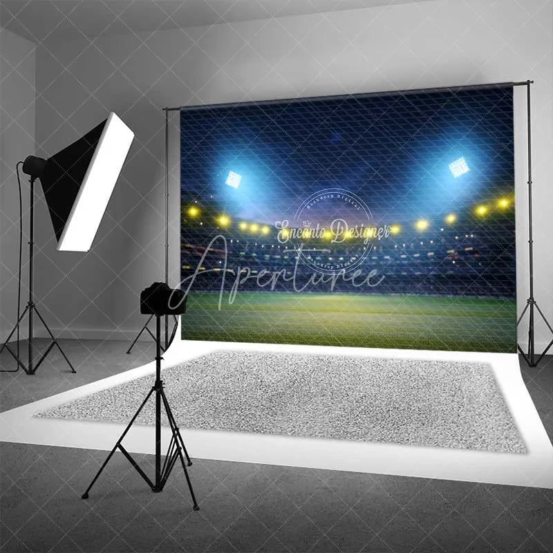 Aperturee - Aperturee Dynamic Sports Stadium Night Game Backdrop Bright Floodlights Green Field Audience Stands Photography Background