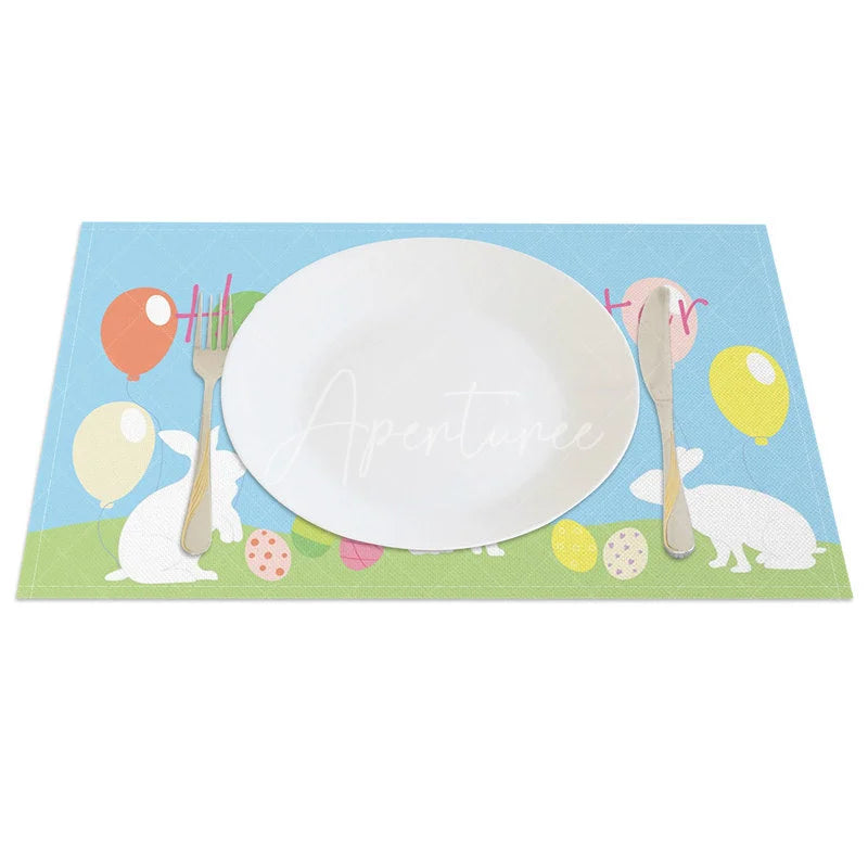 Aperturee - Aperturee Easter Set of 4 Placemats Blue Sky Bunny Silhouettes Happy Easter Balloons Grass Dining Table Mats