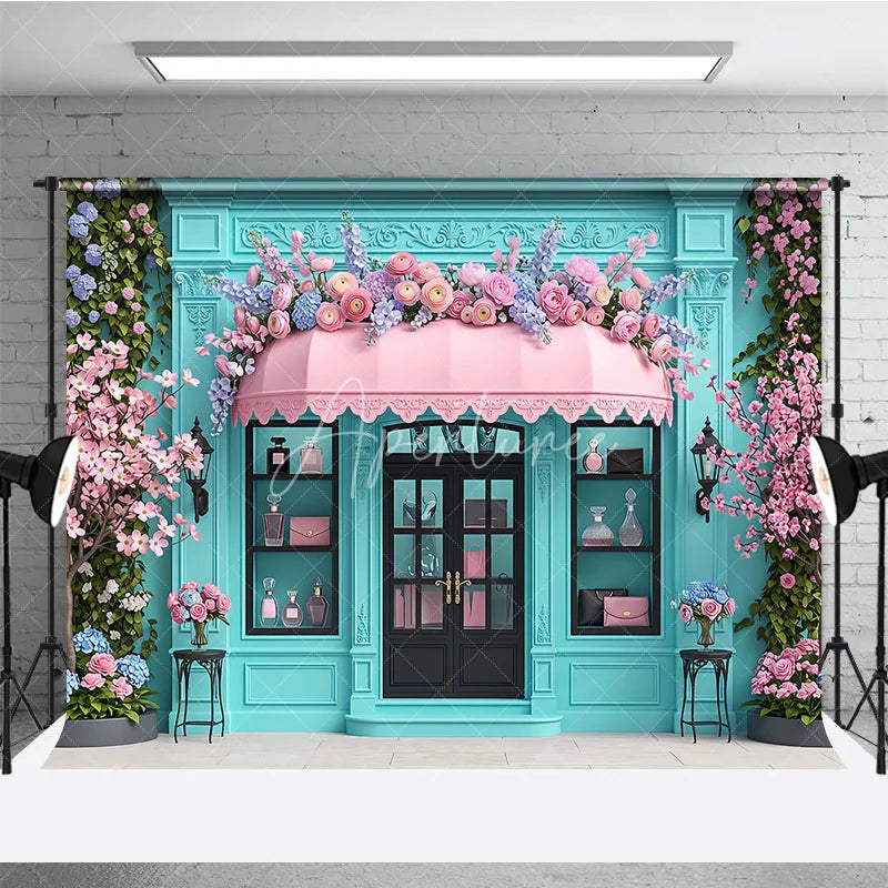 Aperturee - Aperturee Elegant Blue Boutique Storefront Photography Backdrop featuring Pink Awning Cherry Blossoms and Lush Floral Decor