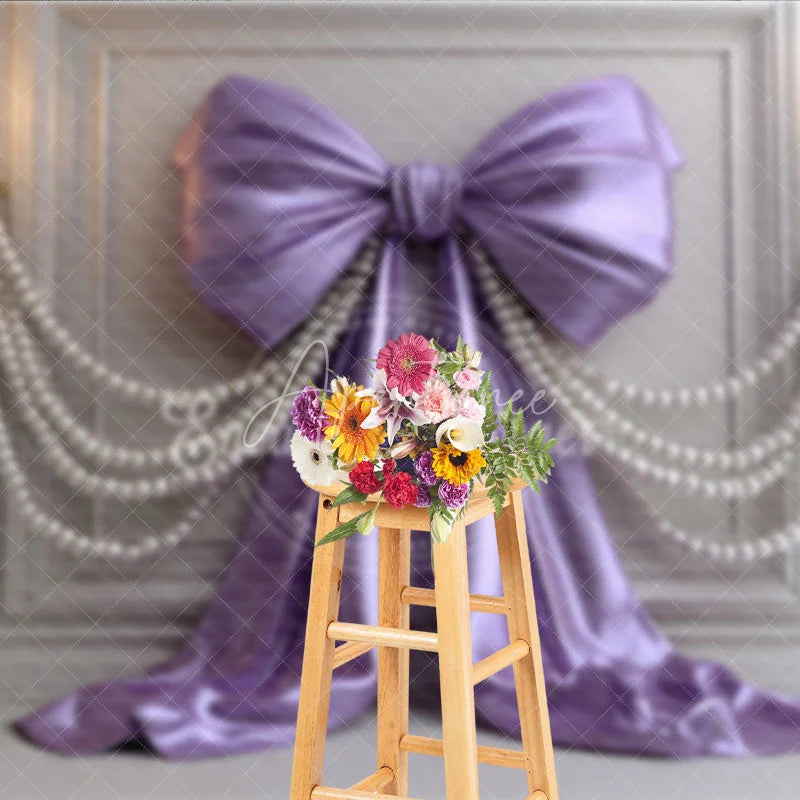 Aperturee - Aperturee Elegant Lavender Satin Bow and Pearl Strands Photography Backdrop White Paneled Wall with Gold Chandeliers