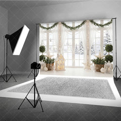 Aperturee - Aperturee Elegant Winter Window Holiday Backdrop with Snow Scene Festive Garlands and Illuminated House Decor