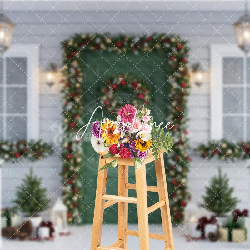 Aperturee - Aperturee Festive Christmas Porch Holiday Backdrop with Green Door Snowy Garlands Wreath and Warm Lights