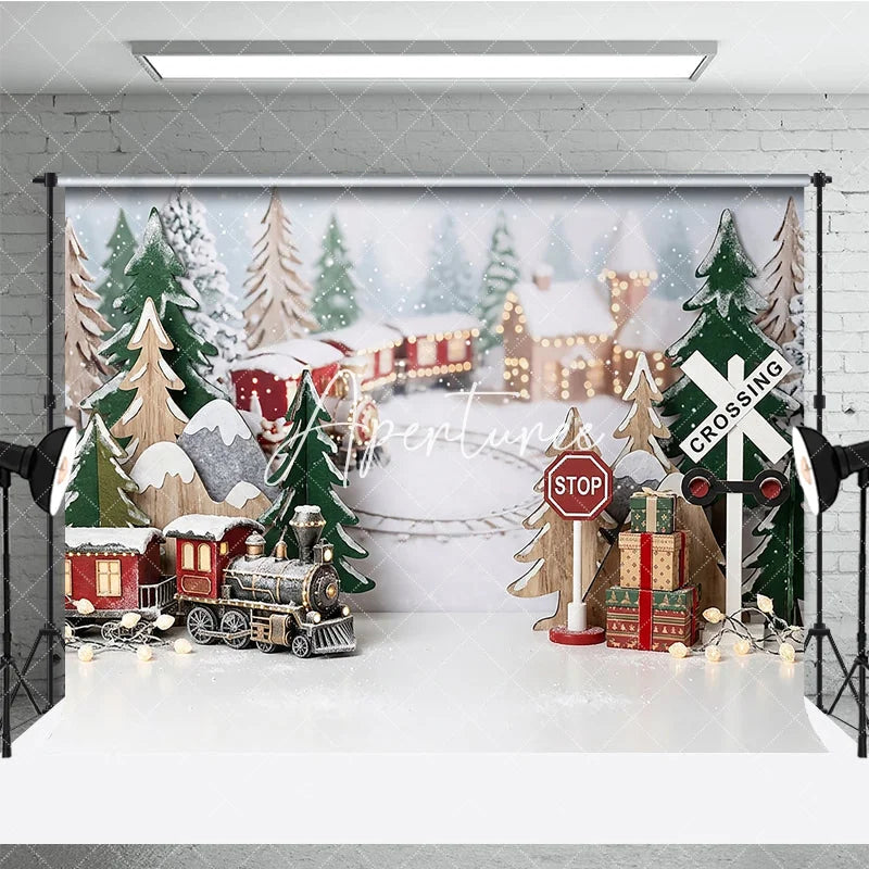 Aperturee - Aperturee Festive Winter Village Holiday Backdrop with Miniature Train Snow Covered Trees and Gift Boxes