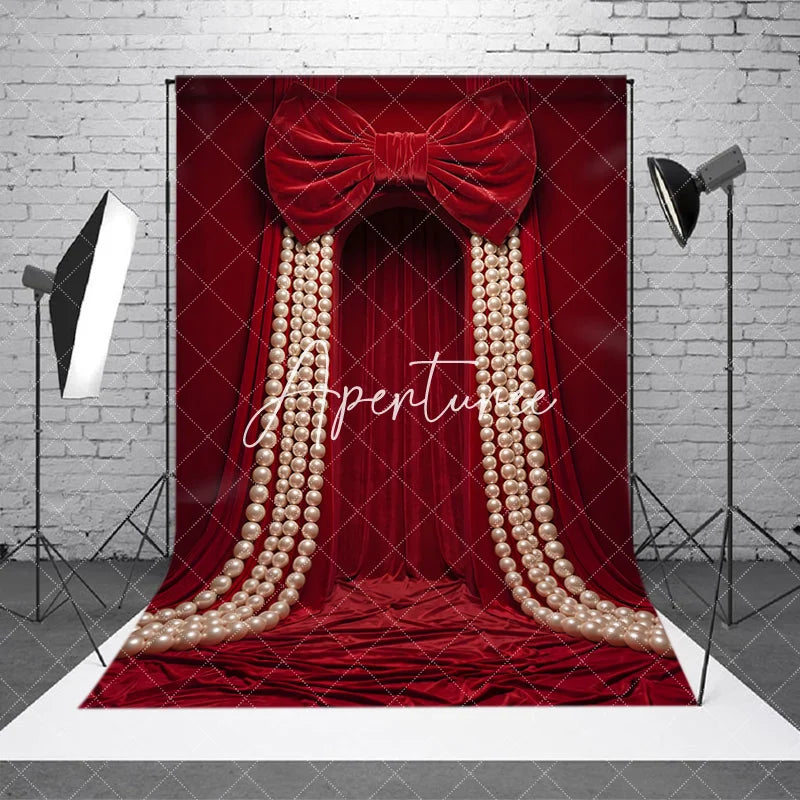 Aperturee - Aperturee Luxurious Red Velvet Curtain Photography Backdrop with Large Bow and Cascading Pearl Strings Elegant Party Decor