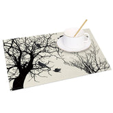 Aperturee - Aperturee Modern Black Tree Silhouette with Birds Set of 4 Placemats for Minimalist and Nature Themed Decor
