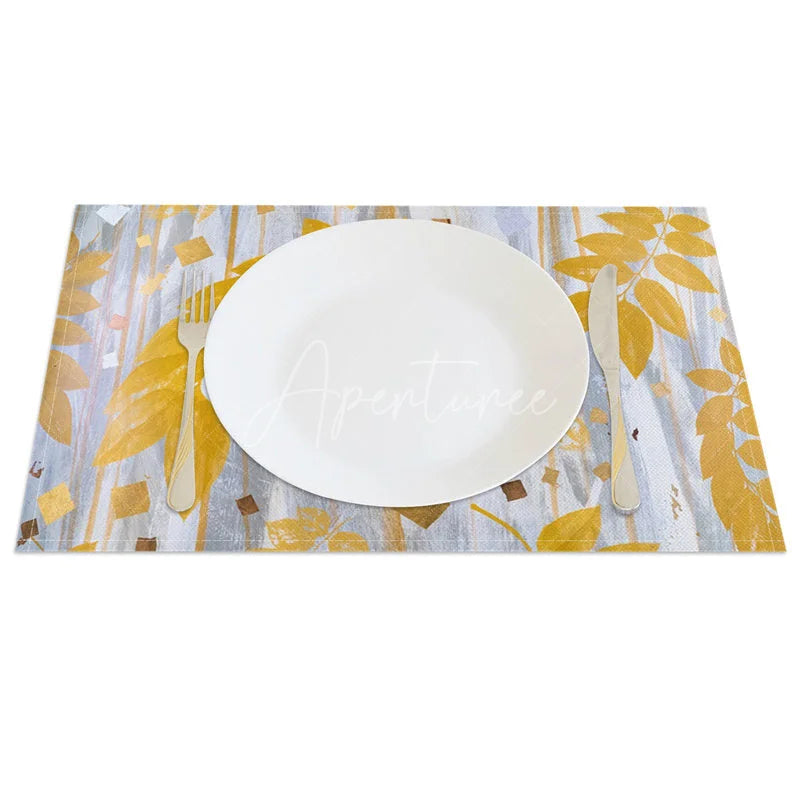 Aperturee - Aperturee Modern Gray and Yellow Leaf Pattern Set of 4 Placemats for Contemporary Fall and Autumn Kitchen Decor