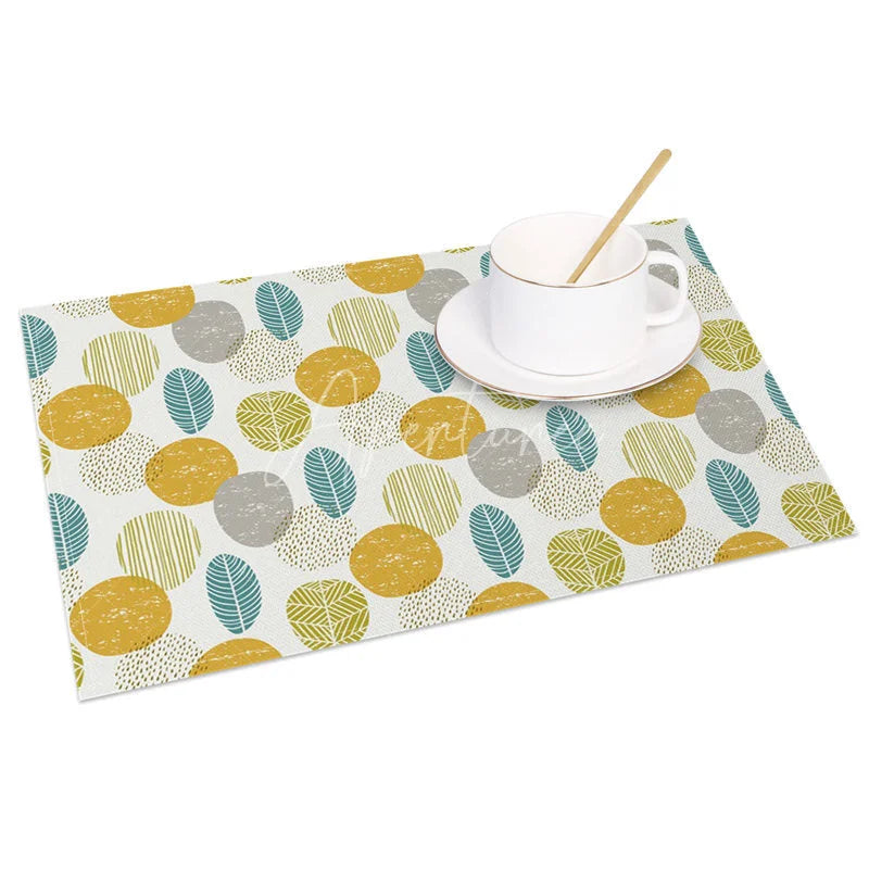 Aperturee - Aperturee Modern Yellow Circle and Green Leaves Set of 4 Placemats for Contemporary and Botanical Kitchen Decor