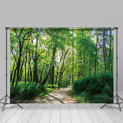 Aperturee - Aperturee Mystical Forest Path Vibrant Green Foliage Backdrop