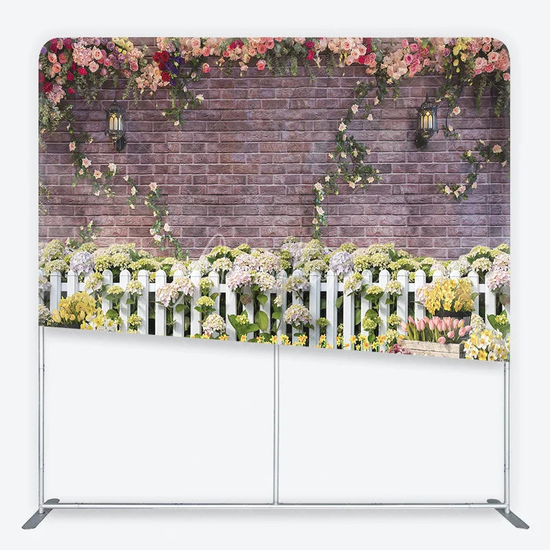 Aperturee - Aperturee Rustic Brick Wall Floral Garlands and White Picket Fence Square Double-Sided Backdrop Vibrant Spring Garden Party