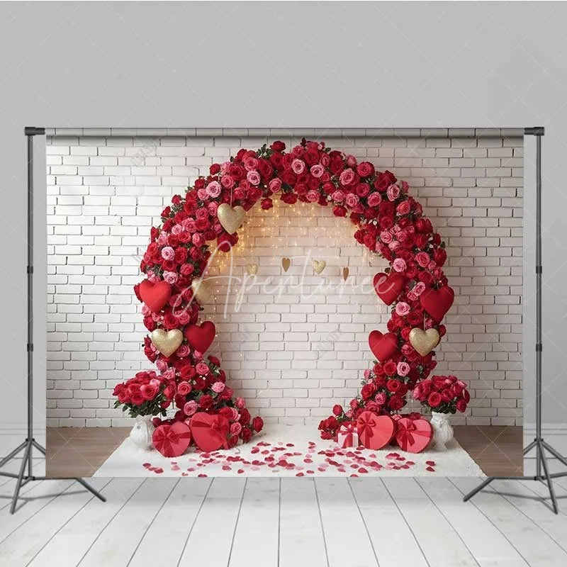 Aperturee - Aperturee Valentine’s Day Red Rose Arch Photography Backdrop White Brick Wall Gold Hearts Photo Background Floral Wedding Prop