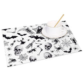 Aperturee - Aperturee White Halloween Set of 4 Placemats with Bats Spiders and Skeletons for Modern Spooky Decor