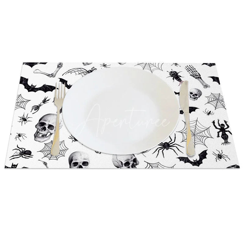 Aperturee - Aperturee White Halloween Set of 4 Placemats with Bats Spiders and Skeletons for Modern Spooky Decor