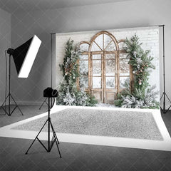 Aperturee - Aperturee Winter Window Backdrop Snowy Pine Forest View Arched Wood Door White Brick Wall Christmas Background
