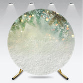 Aperturee - Aperturee Winter Wonderland Round Backdrop with Pine Branches and Snow Warm Bokeh Lights for Christmas Celebrations