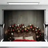 Black and gold christmas ornament garland with red berries, green leaves, and metallic accents.