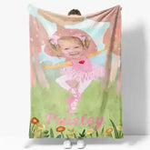 Pink tutu blanket with floral design and name ’paisley’ in cursive.