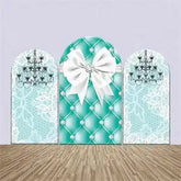 Tiffany blue quilted leather clutch with white bow and diamond accent.