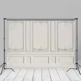 White ornate wall panel backdrop