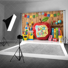 Aperturee - Aperturee Back to School Apple Photography Backdrop with Colorful Art and Learning Supplies Wooden Wall Background