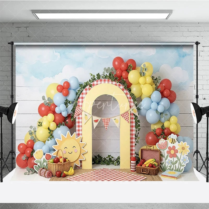 Aperturee - Aperturee Cheerful Picnic Photography Backdrop with Red Yellow Blue Balloons Gingham Arch and Summer Fruits for Birthday Party