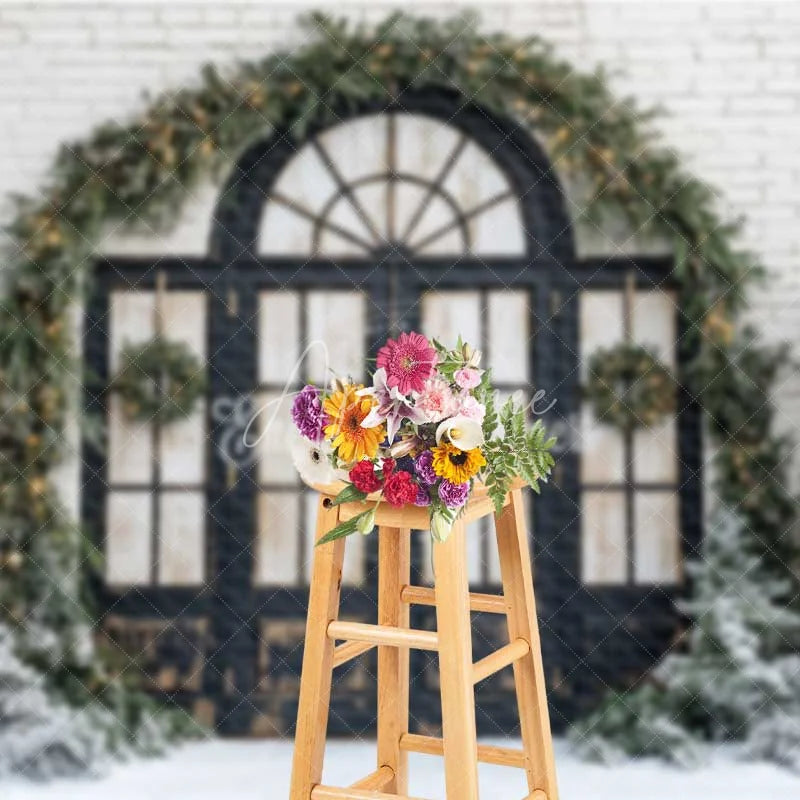 Aperturee - Aperturee Christmas Front Door Backdrop Black Arched Window Wreath Pine Trees Lights Snow White Brick Background