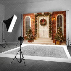 Aperturee - Aperturee Christmas Front Porch Photography Backdrop White Door with Brick Wall and Garland Holiday Photo Background