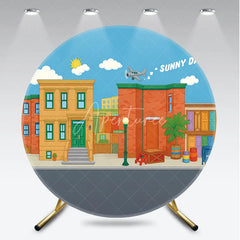 Aperturee - Aperturee Colorful Cartoon City Street Round Backdrop with Sunny Days Sky Neighborhood Buildings and Flying Airplane.
