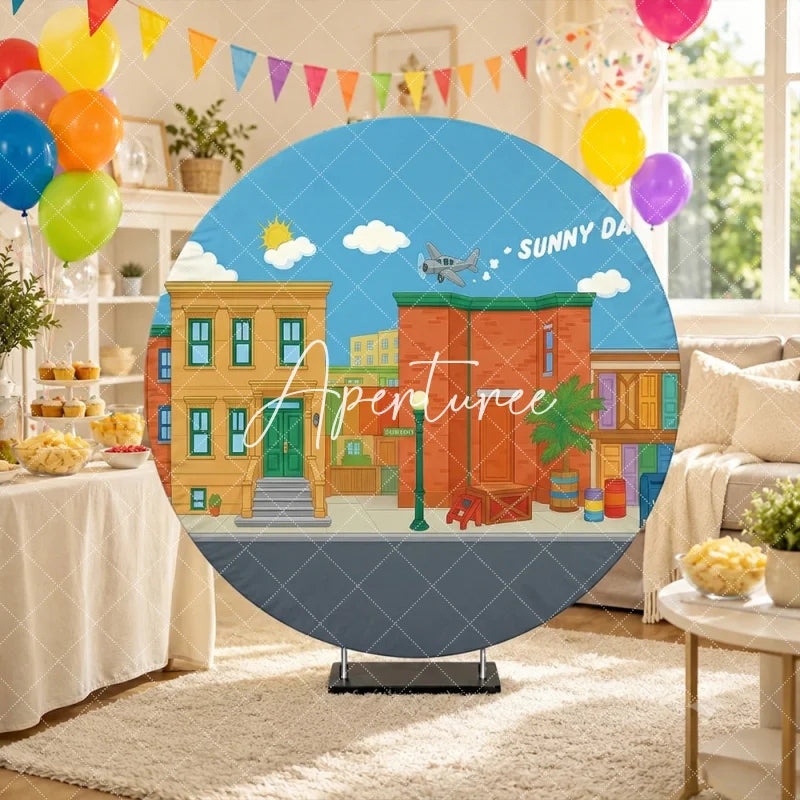 Aperturee - Aperturee Colorful Cartoon City Street Round Backdrop with Sunny Days Sky Neighborhood Buildings and Flying Airplane.