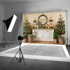 Aperturee - Aperturee Cozy Rustic Christmas Trees and White Cabinet Holiday Backdrop Elegant Gold Mirror and Lanterns Decor