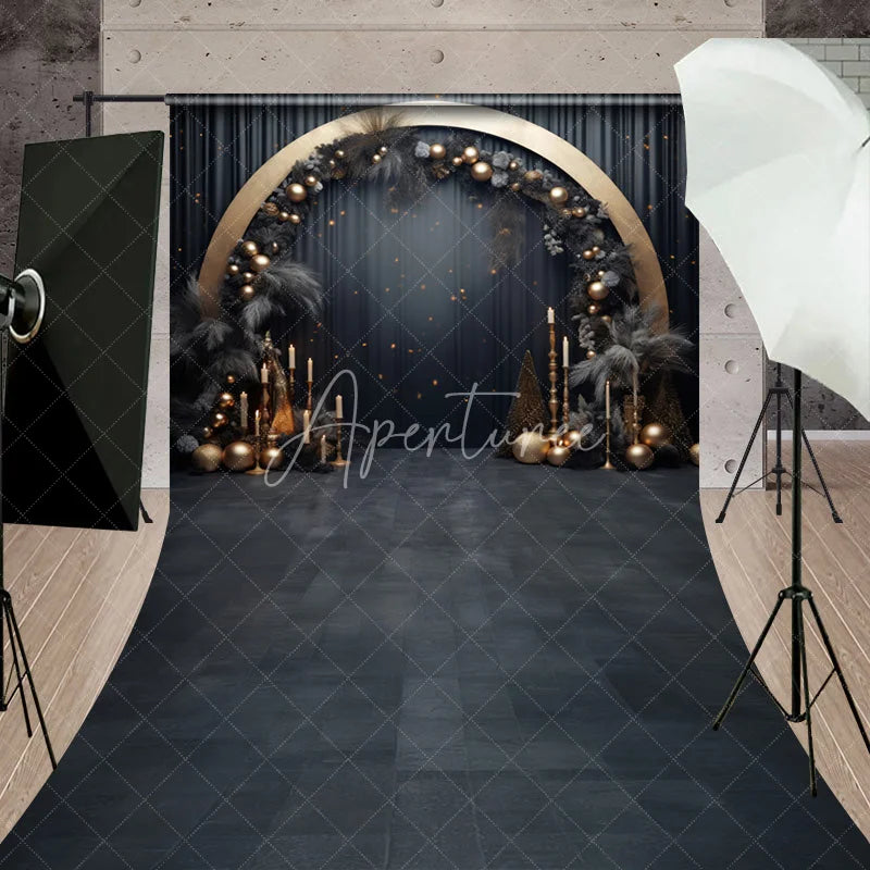 Aperturee - Aperturee Elegant Black and Gold Sweep Backdrop with Golden Arch Dark Foliage and Festive Baubles for Celebrations
