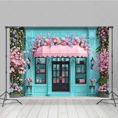 Aperturee - Aperturee Elegant Blue Boutique Storefront Photography Backdrop featuring Pink Awning Cherry Blossoms and Lush Floral Decor