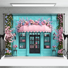 Aperturee - Aperturee Elegant Blue Boutique Storefront Photography Backdrop featuring Pink Awning Cherry Blossoms and Lush Floral Decor