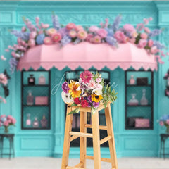 Aperturee - Aperturee Elegant Blue Boutique Storefront Photography Backdrop featuring Pink Awning Cherry Blossoms and Lush Floral Decor
