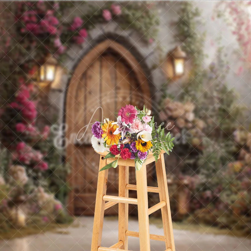 Aperturee - Aperturee Enchanted Garden Photography Backdrop with Arched Wooden Door Lush Flowers and Lanterns for Fairy Tale Theme