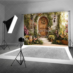 Aperturee - Aperturee Enchanted Garden Photography Backdrop with Rustic Wooden Door Lush Greenery and Colorful Flowers for Spring Portraits