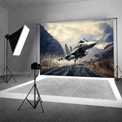 Aperturee - Aperturee Fighter Jet Taking Off over Mountain Road Backdrop Supersonic Aviation Photography Background