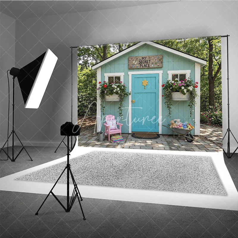 Aperturee - Aperturee Light Blue Playhouse Photography Backdrop with Turquoise Door My Secret Place Sign and Colorful Garden Flowers
