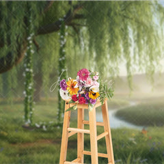 Aperturee - Aperturee Lush Green Willow Tree Photography Backdrop with Floral Swing Serene River and Spring Meadow Scene