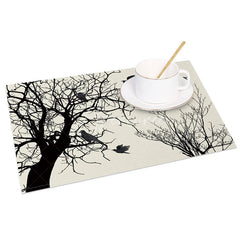 Aperturee - Aperturee Modern Black Tree Silhouette with Birds Set of 4 Placemats for Minimalist and Nature Themed Decor