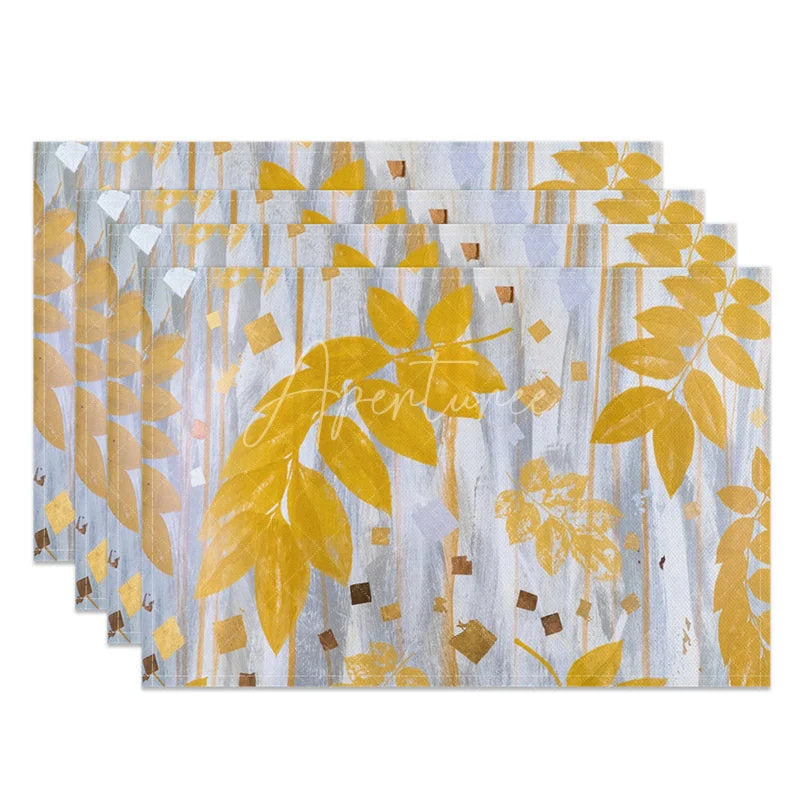 Aperturee - Aperturee Modern Gray and Yellow Leaf Pattern Set of 4 Placemats for Contemporary Fall and Autumn Kitchen Decor