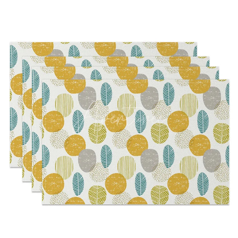 Aperturee - Aperturee Modern Yellow Circle and Green Leaves Set of 4 Placemats for Contemporary and Botanical Kitchen Decor
