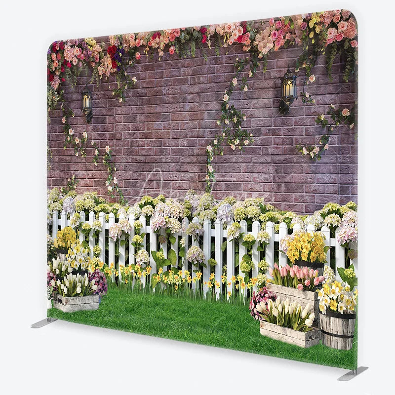 Aperturee - Aperturee Rustic Brick Wall Floral Garlands and White Picket Fence Square Double-Sided Backdrop Vibrant Spring Garden Party