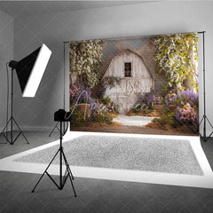 Aperturee - Aperturee Rustic White Barn Photography Backdrop with Flowering Trees and Purple Pink Flowers Hay Bales for Spring Portraits