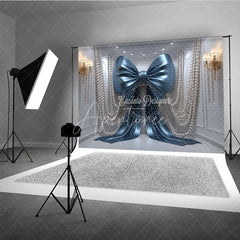 Aperturee - Aperturee Shiny Blue Bow with Elegant Pearls and Gold Sconces Photography Backdrop Luxurious Party Decor