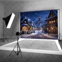 Aperturee - Aperturee Snowy Medieval Village at Night with Warm Glowing Lights Photography Backdrop Winter Holiday Celebration Decor